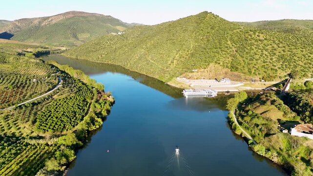 Aerial view of a boat navigating the douro river