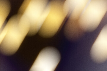 Fototapeta premium Abstract motion blur background creating warm golden light streaks and atmospheric glow