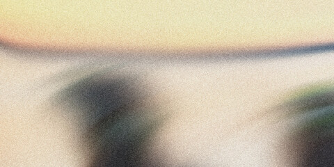 Blurry abstract image with beige and yellow hues and texture © Splash