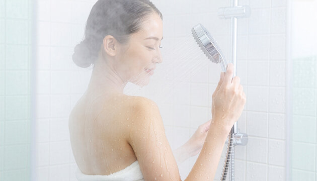 Japanese woman relaxing while taking a shower, bath time and skincare routine　シャワーを浴びてリラックスする日本人女性 バスタイムとスキンケアの習慣