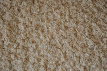 Textured wool fabric close up surface © reddish