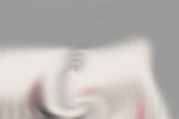 Obraz premium Blurry white and red abstract image on gray background