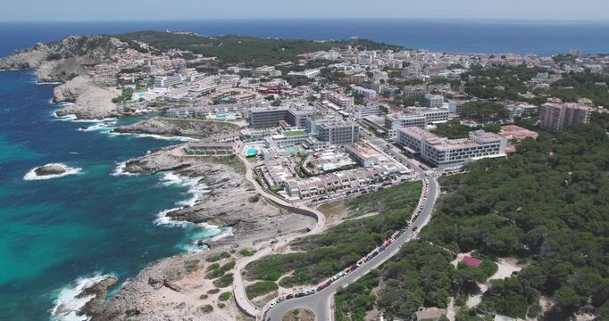 Aerial view of Cala Agulla hotels and resort coastline in Mallorca Spain