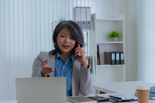 Confident female executive representing productivity and leadership