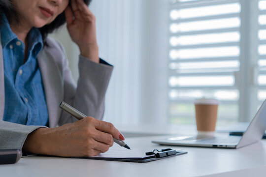 Confident female executive representing productivity and leadership