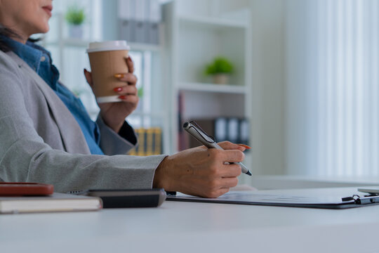 Confident female executive representing productivity and leadership