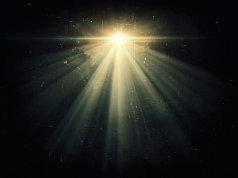 Cinematic grunge light leak background with dramatic volumetric god rays piercing through darkness. Authentic film scratches, dust, grain and light leaks create a moody retro atmosphere 