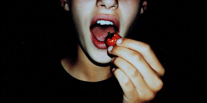 Cherry in Mouth Close-Up