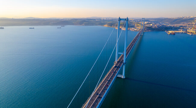 Osmangazi Bridge in Kocaeli, Turkey. Aerial shot with drone. Beautiful sunset landscape.