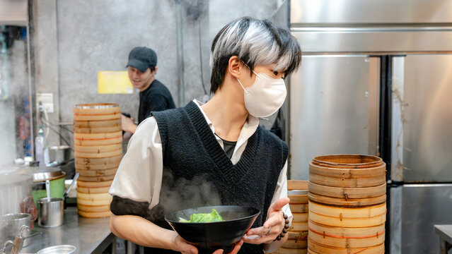 Taiwanese restaurant kitchen with steaming delicacies