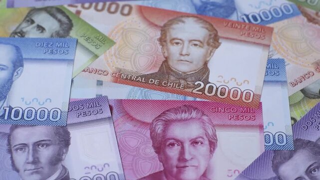 Chilean paper currency, peso, for financial transactions and exchange. Chilean peso currency as a background for your design