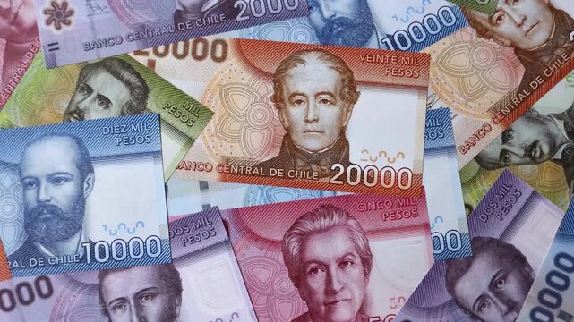 Chilean paper currency, peso, for financial transactions and exchange. Chilean peso currency as a background for your design