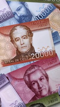 Chilean paper currency, peso, for financial transactions and exchange. Chilean peso currency as a background for your design