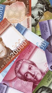 Chilean paper currency, peso, for financial transactions and exchange. Chilean peso currency as a background for your design