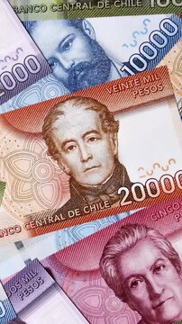 Chilean paper currency, peso, for financial transactions and exchange. Chilean peso currency as a background for your design