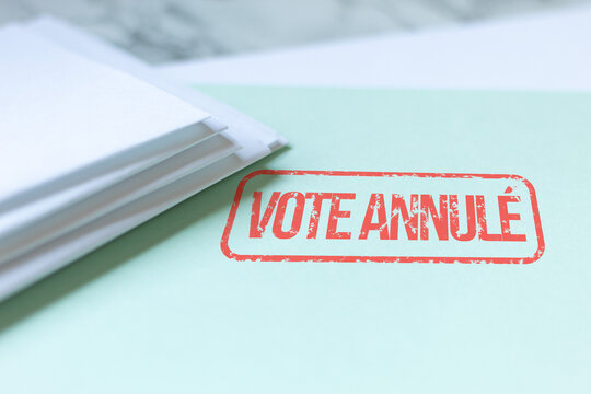 Vote invalidated stamp in French applied to an election document, concept of vote invalidation