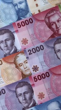 Chilean paper currency, peso, for financial transactions and exchange. Chilean peso currency as a background for your design