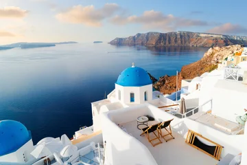 blue domes and volcano caldera with deep sea landscape, beautiful details of Santorini island, Greece © neirfy