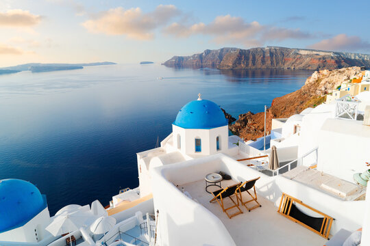blue domes and volcano caldera with deep sea landscape, beautiful details of Santorini island, Greece