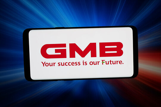 Stuttgart, Germany - 04-16-2026: In this photo illustration, the logo of Japanese automotive company GMB Corporation is displayed on a smartphone in front of abstract background on computer screen.