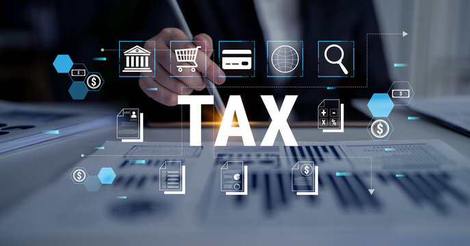 Businessman Analyzing Financial Data with Tax Icons and Graphs on a Desk in an Office Environment Focused on Taxes and Financial Management Fluxor.