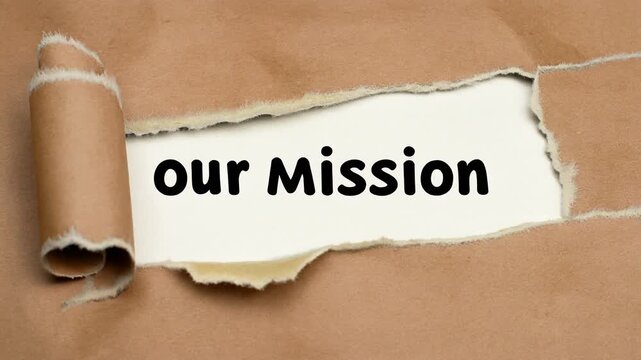 Stop-Motion Animation Revealing "our Mission" Text Through Torn Brown Paper