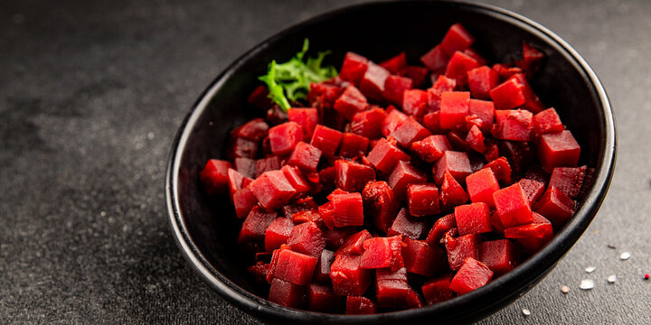 Beets cubes beetroot boiled or canned vegetable lunch or dinner tasty snack fresh, tasty gourmet food background on the table rustic food top view, copy space keto and paleo diets vegetarian and  