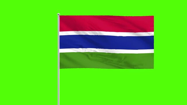 Gambian Flag's Colors in the Wind: A vibrant display of the Gambian flag, its colors rippling gently in the breeze.