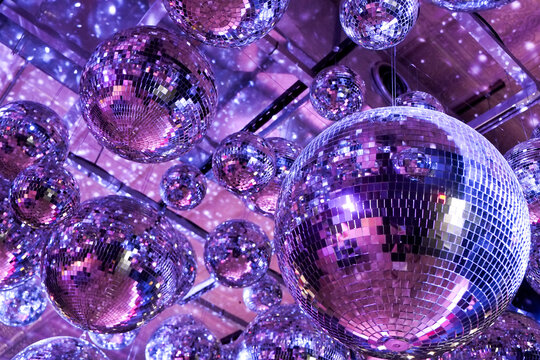 Purple Disco Balls and Party Light Reflections