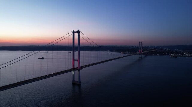 Osmangazi Bridge in Kocaeli, Turkey. Aerial shot with drone. Beautiful sunset landscape. 