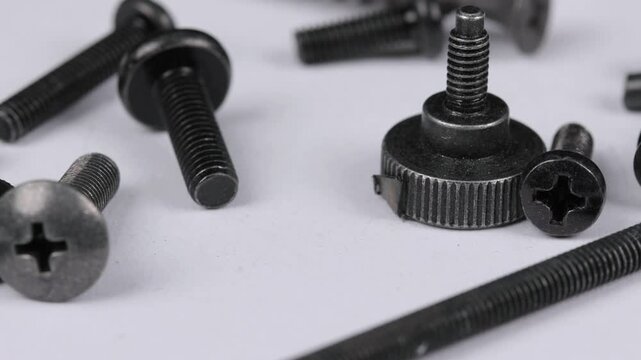 Metal screws for fastening equipment. Soft focus. Close-up. 