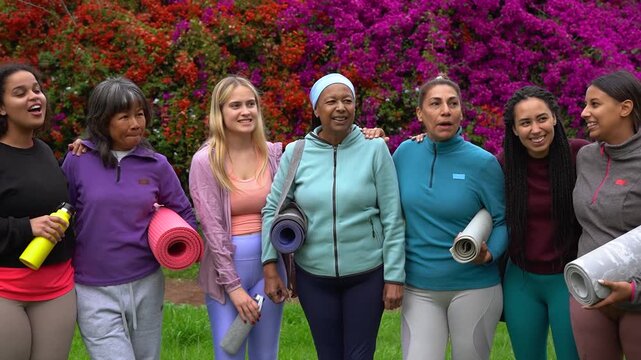 Group of multiracial women with different body and age having fun after sport workout at city park - Multi generational people, healthy lifestyle and yoga concept