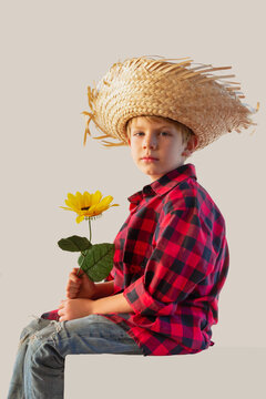 Caucasian child dressed for the June fiestas in Brazil, isolated on a light background