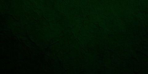 Deep forest green textured paper background with subtle grain and organic fiber details for elegant luxury backdrop. © Jharna Akter