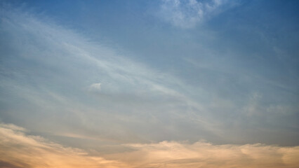 Fototapeta premium Sky and cloud background. Beautiful sky scenes with dramatic clouds and colorful sunrise and sunset light. Perfect for nature backgrounds weather concepts calm atmosphere and sunset skies background.