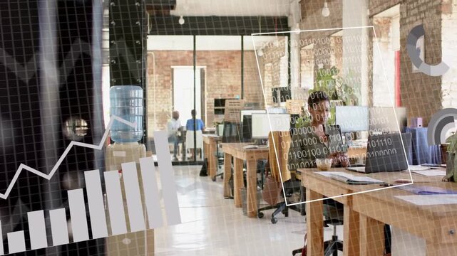 Woman using laptop and tapping phone in office, tapping initiating business chart overlays cycling