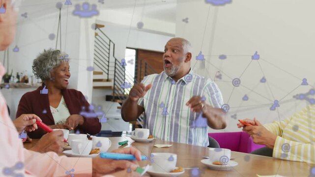 striped man at table pointing after comment, celebrating highfives, cups, social overlay drifting