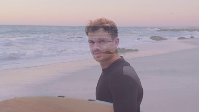 Surfer turning to viewer as waves causing stepping and regripping, smiling, ghosting selling travel