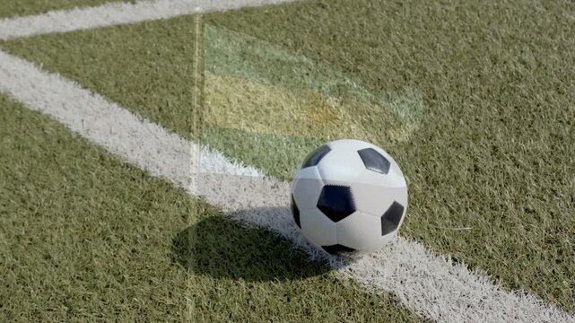 Playback starting, soccer ball rolling and sliding along painted boundary line, showing settling