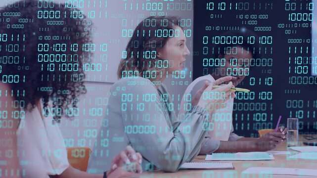 Center woman starting speaking, gesturing with markers, colleagues noting data under binary overlay