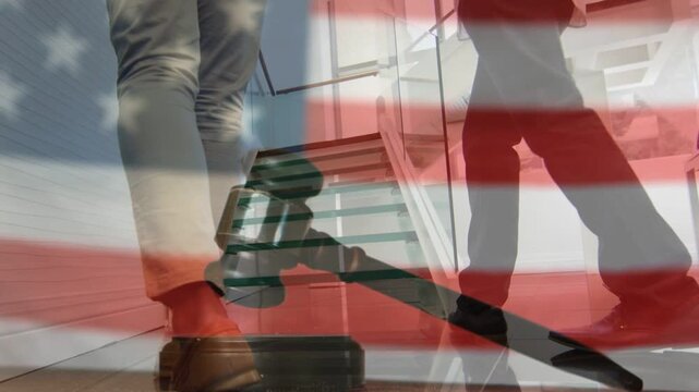 Two male partners stepping near block, causing gavel and flag overlays, holding folder, evoking law