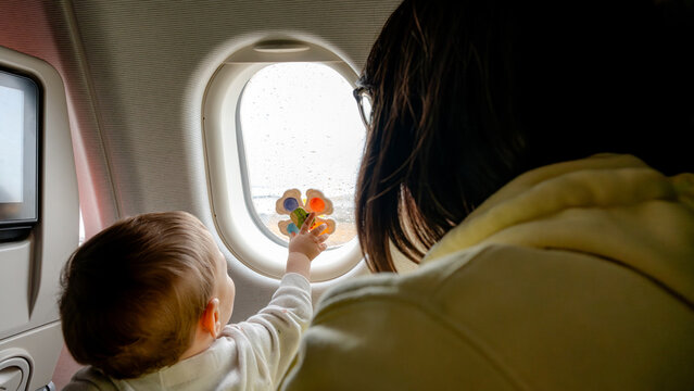 Baby enjoying a family plane trip
