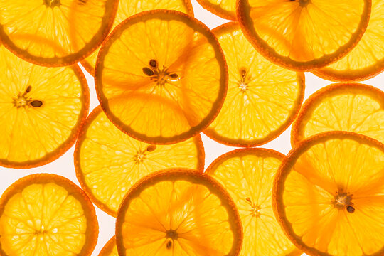 Citrus fruit slices pattern on bright white background