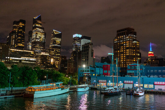 New York cityscape at night featuring illuminated skyline