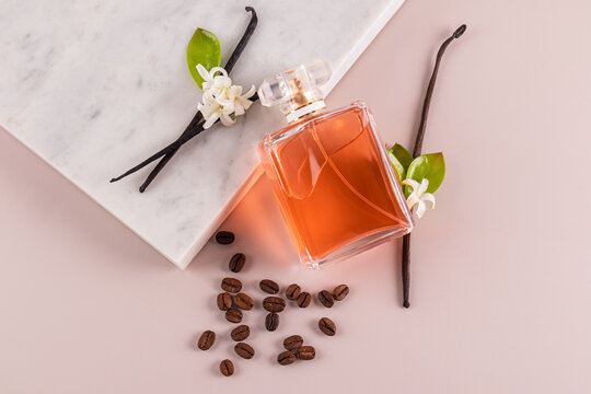 Perfume bottle with vanilla and coffee elements