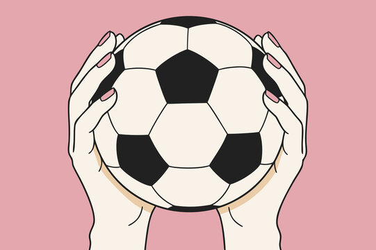 Hands holding a soccer ball on pink background