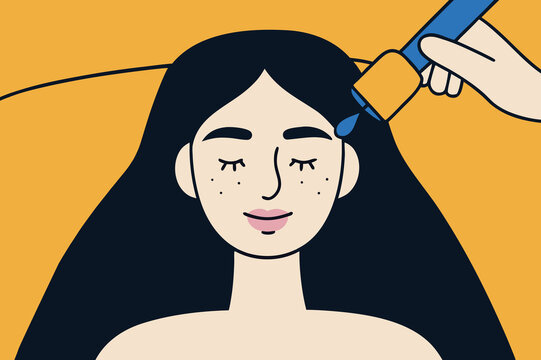 Woman receiving facial skincare treatment in modern salon
