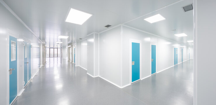 Clean candy lab factory corridor with sterile blue doors