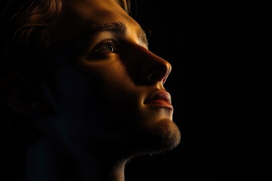 A person's facial features in low light, suitable for use in crime stories or suspenseful scenes