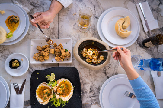 Mediterranean seafood meal with friends